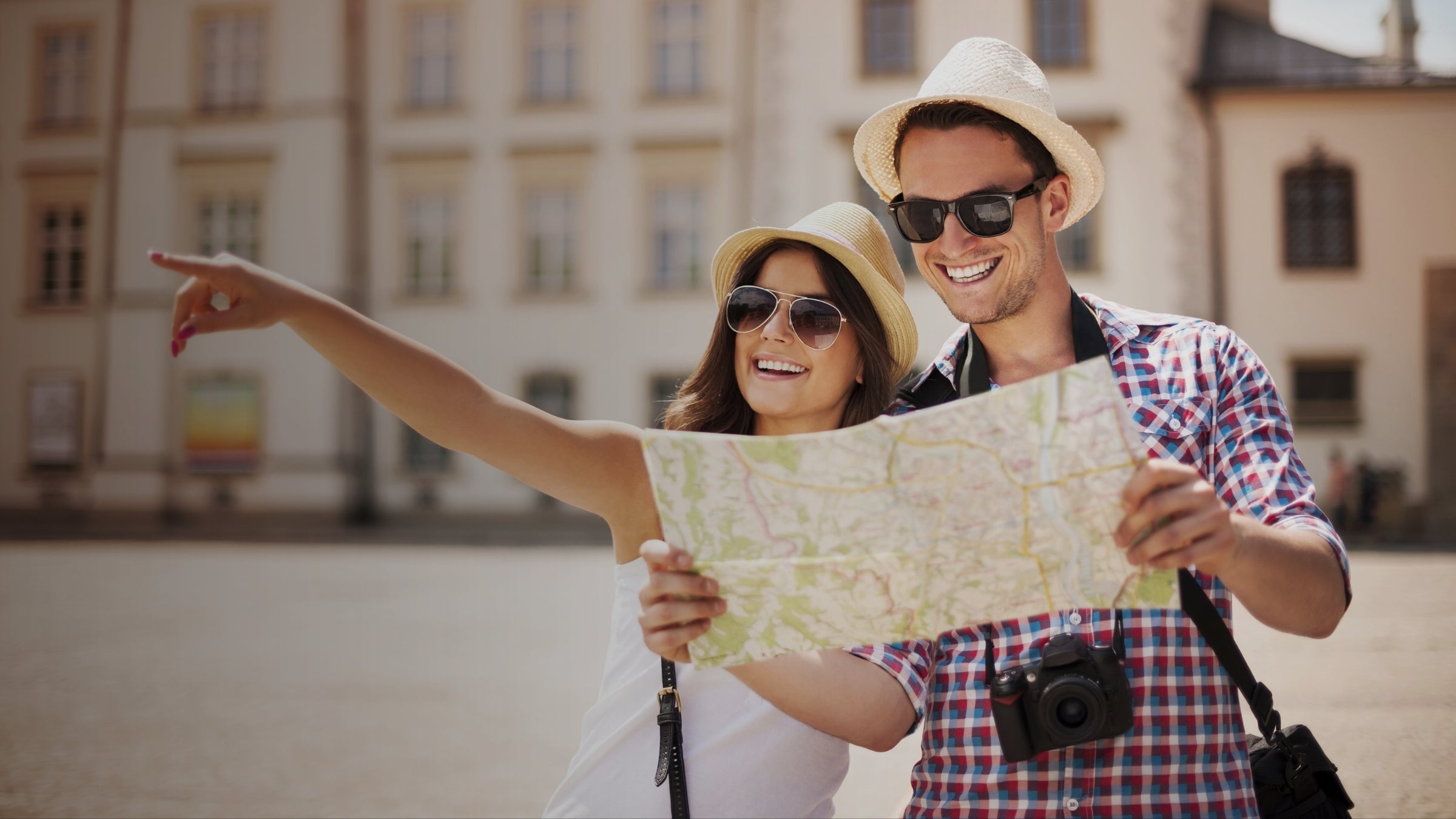Two people with a map in an urban setting